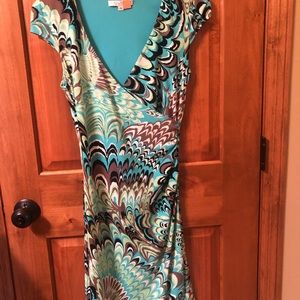 Fun print faux wrap style dress .